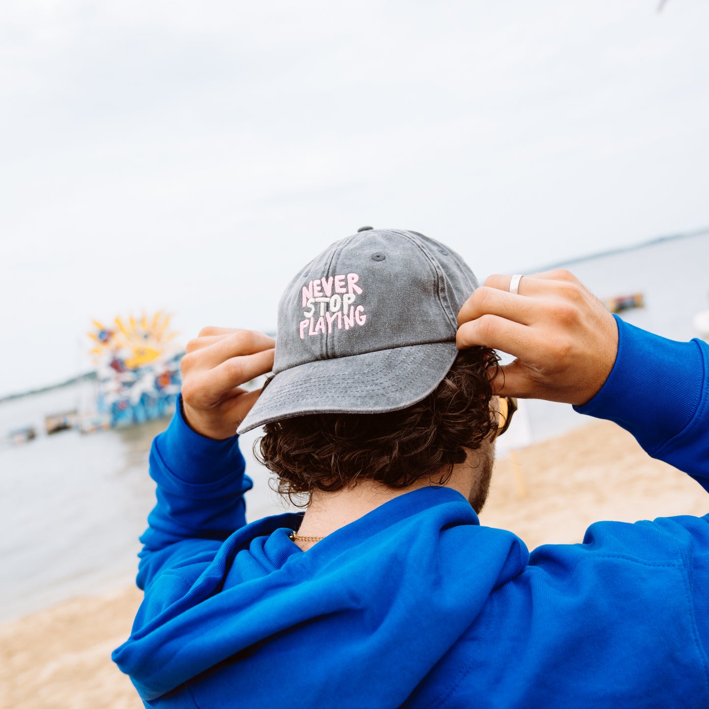 Pangea Festival Merch Cap Never Stop Playing 2025
