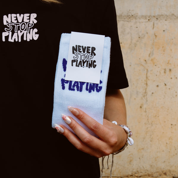 Never Stop Playing Tennissocken in weiß mit Logo 
